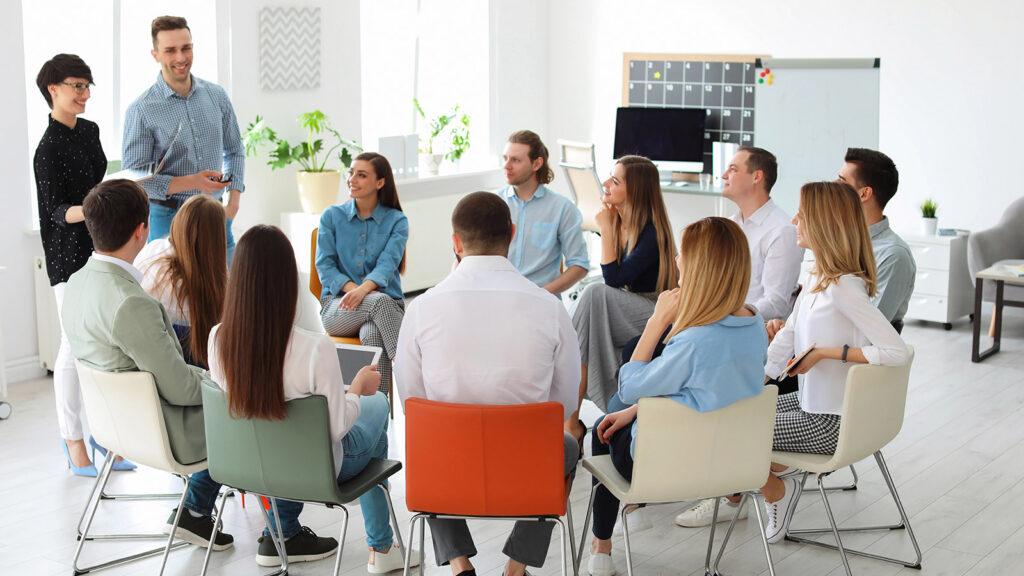 Should You Provide Active Shooter Training To Employees? Absolutely. 2 Employees taking crises management training in the workplace